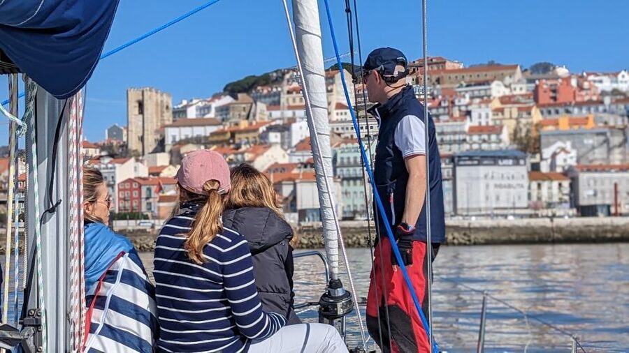 Lisbon: Private Boutique Boat Tour – Sail in Style - Taking the wheel and learning to sail