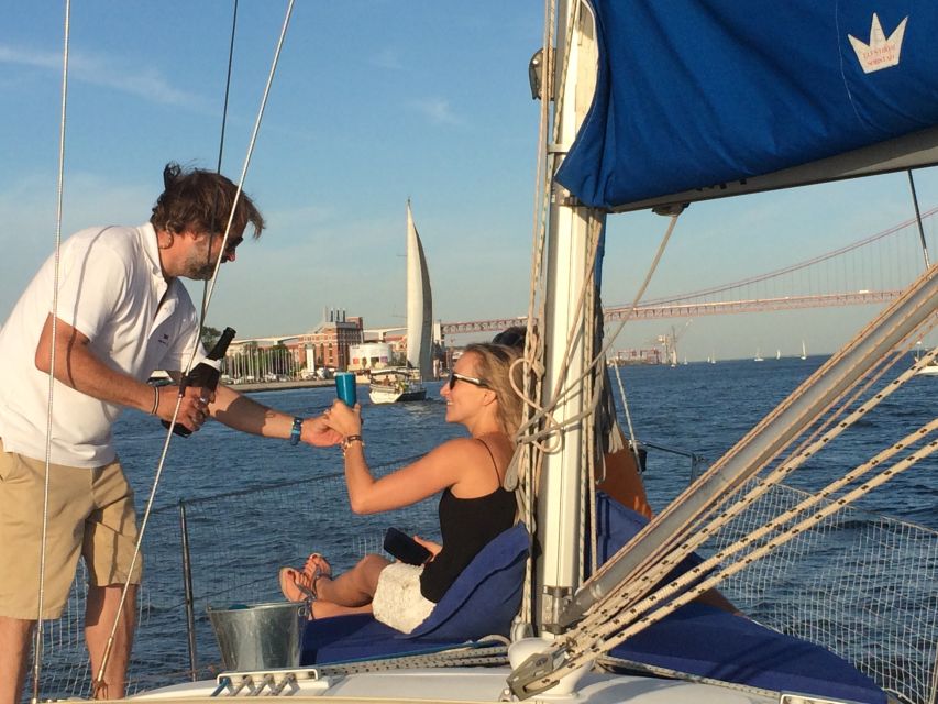 Lisbon: Private Sunset Sailing Tour with Champagne - Crossing toward Cristo Rei and the south bank