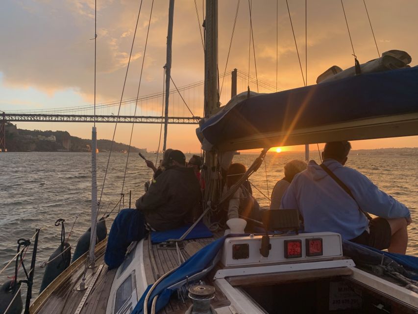 Lisbon: Sailboat Sunset Tour with a Drink - The welcome drink sets the easygoing mood