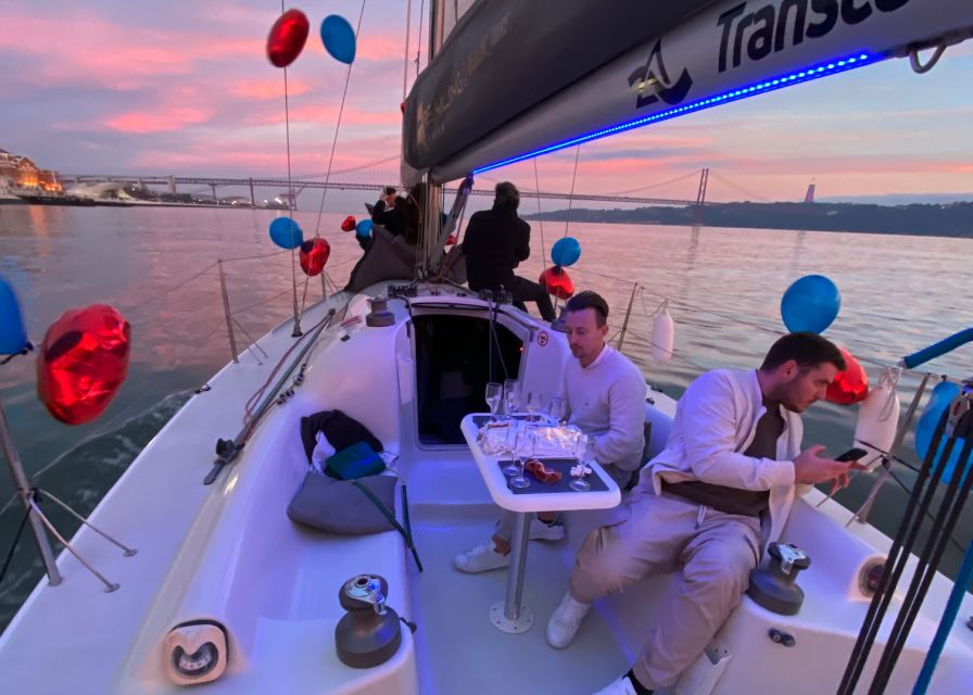 Lisbon: Sailboat Tour w/ Local Guide and Open Bar Green Wine - Finding the boat beneath the 25 de Abril Bridge