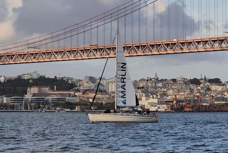 Lisbon: Sailing Boat Tour with Drinks & Pastel de Nata - Belém Tower from the front deck