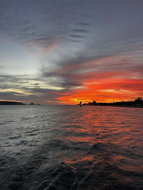 Lisbon: Sailing Boat Tour with Drinks & Pastel de Nata - Wine, pastel de nata, and simple Portuguese hospitality