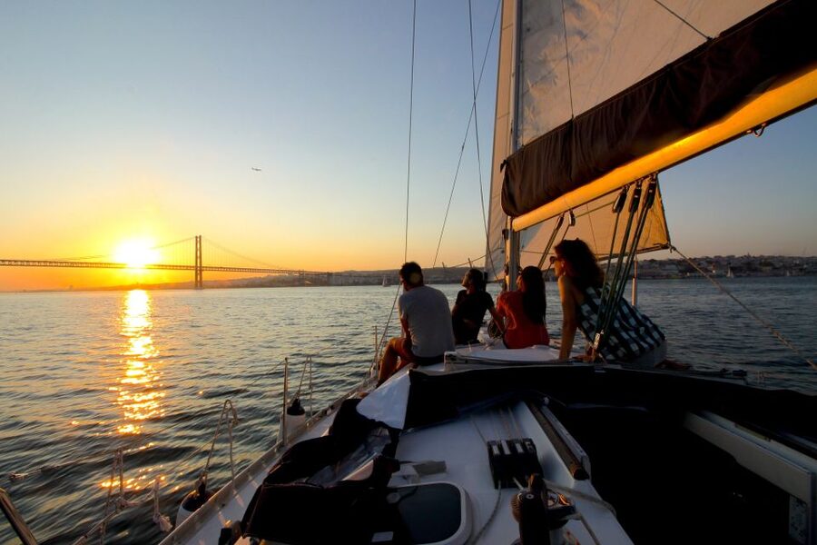 Lisbon: Sailing Tour with Wine and Snacks - Under the 25 de Abril Bridge