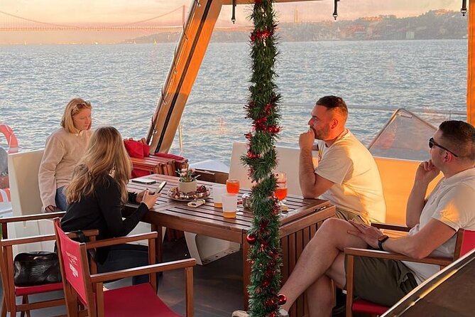Lisbon : Sunset Catamaran Boat Tour with Music and Drinks - Belém Tower from the Tagus