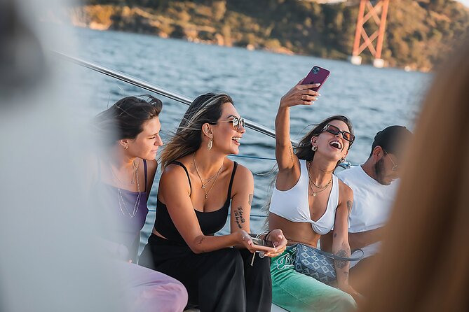 Lisbon : Sunset Catamaran Boat Tour with Music and Drinks - Music, drinks, and the real onboard mood