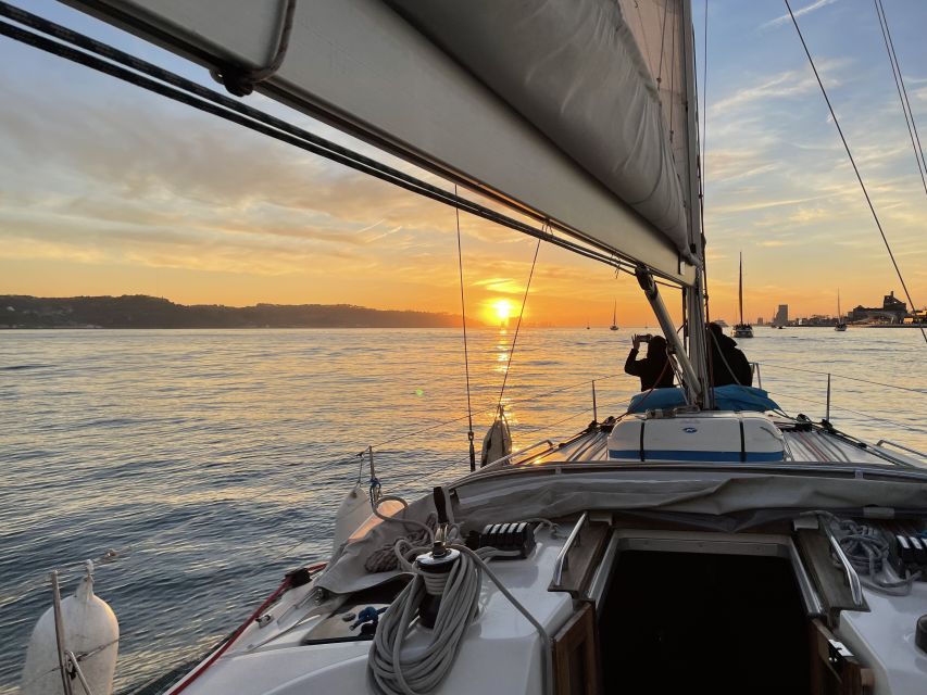 Lisbon: Sunset Sailing Boat Cruise with Wine - The guides make the ride personal