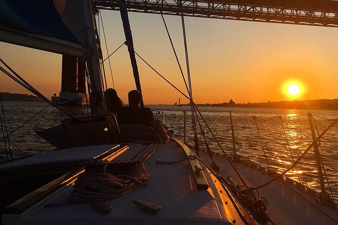 Lisbon Sunset Sailing Tour with White or Rosé Wine and Snacks - The 25 de Abril Bridge from below