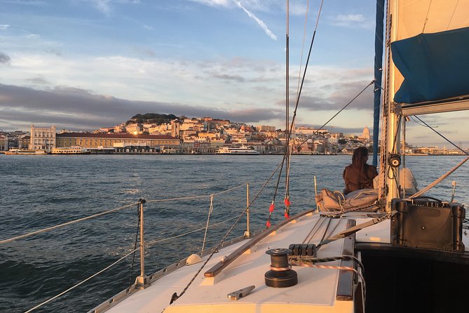 Lisbon Sunset Sensations on a Private Sailing Boat with wine&snacks - Under the 25 de Abril Bridge