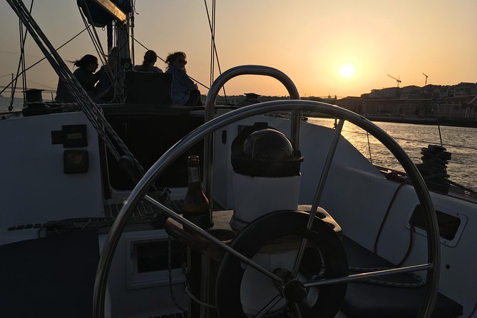 Lisbon Sunset Sensations on a Private Sailing Boat with wine&snacks - Starting at Doca Alcântara at 6:00 pm