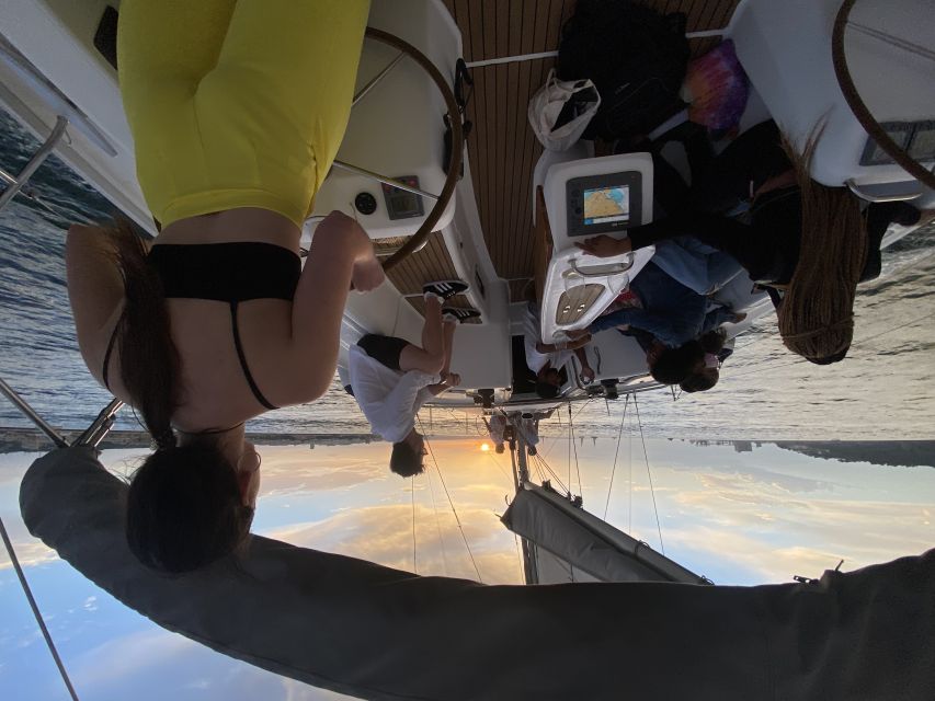 Lisbon: Tagus River Sailboat City Cruise - Alfama, the cathedral, and the hills behind the water