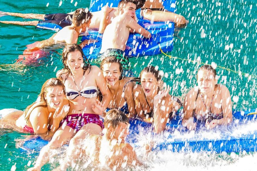 Lloret de Mar: Catamaran Sailing Cruise with BBQ and Drinks - Music, dancing, and choosing the right departure