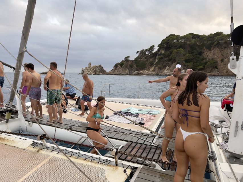 Lloret de Mar: Sunset Catamaran Cruise with DJ and Drinks - A two-hour sunset ride from Lloret de Mar
