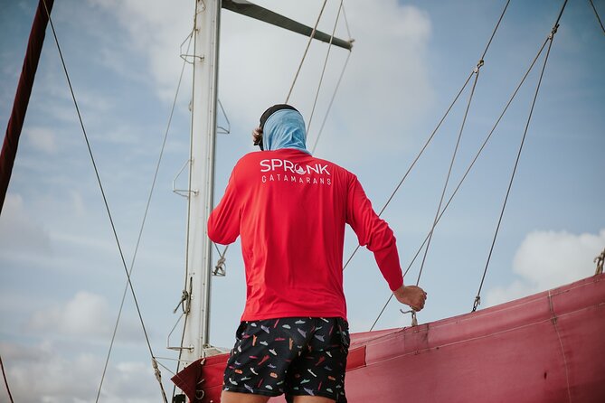 Luxury Champagne and Lobster Sail to Boca Catalina - Who will enjoy this Aruba sail most