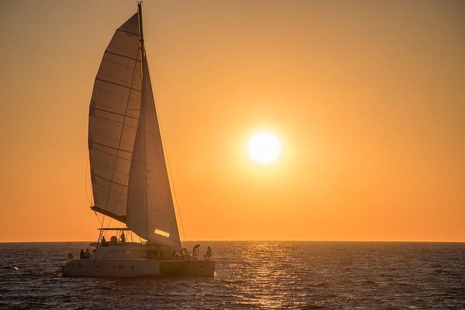 Luxury Small-Group Catamaran Cruise with BBQ, Open bar & Transfer - Indian Rocks and Santorini’s volcanic shapes
