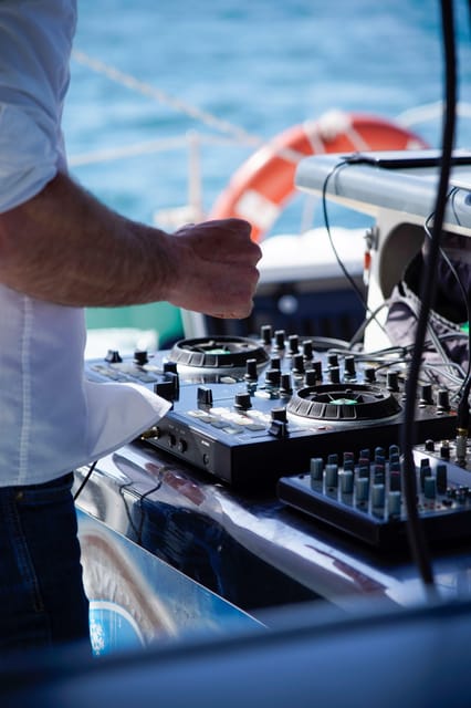 Malaga: Catamaran Sailing Cruise with Swimming & Optional DJ - Drinks and service on the catamaran