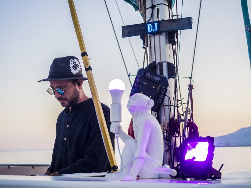 Malaga: Catamaran Sunset or Night Cruise w/ Live DJ & Drink - Dolphins, photographs, and the element of luck