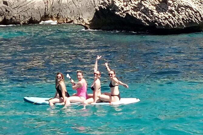 Mallorca Catamaran Small Group Cruise with Tapas 4-hours - The swim and snorkel stop in clear water