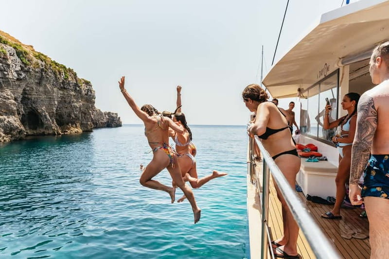 Malta: Blue Lagoon, Beaches & Bays Trip by Catamaran - Music, cocktails, and the social mood