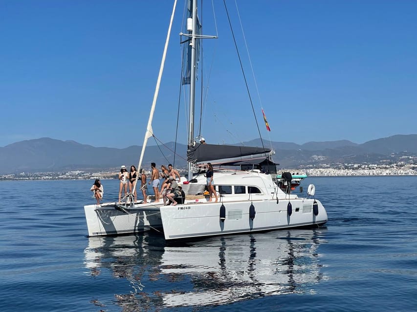 Marbella: Group Dolphin Watching Catamaran Tour with Snacks - Two Hours Along the Marbella Coast