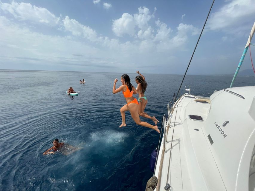 Marbella: Group Dolphin Watching Catamaran Tour with Snacks - Booking and Packing Advice