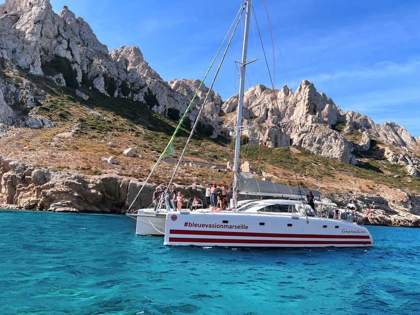 Marseille: Calanques Catamaran Cruise, Picnic, & Swimming - En-Vau, Port Pin, and Port-Miou complete the coastal sweep