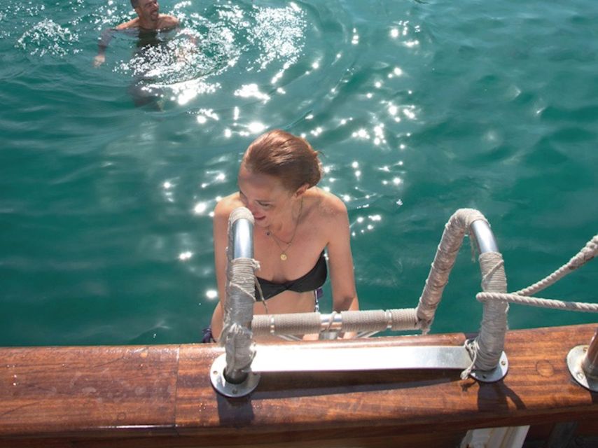 Marseille: Calanques Sailing Day Trip with Lunch and Wine - Swimming beneath the cliffs