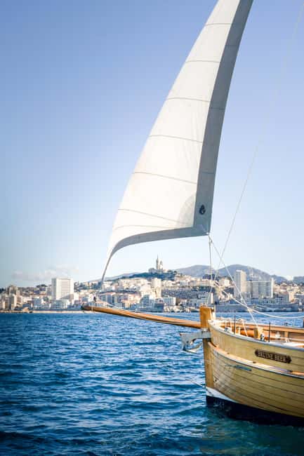 Marseille: Day sailing in the heart of the Calanques with organic lunch and wine - Leaving the harbor past Château d’If