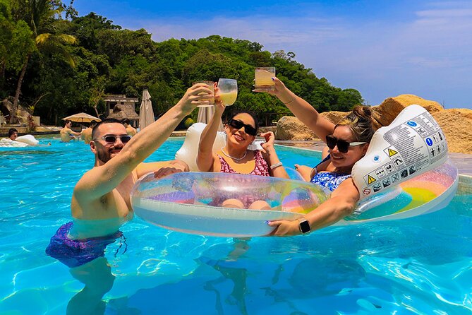 Mega Catamarans ALL INCLUSIVE Remote Paradise Beach Adventure - Playa Chica Locca: pool, beach beds, and water toys