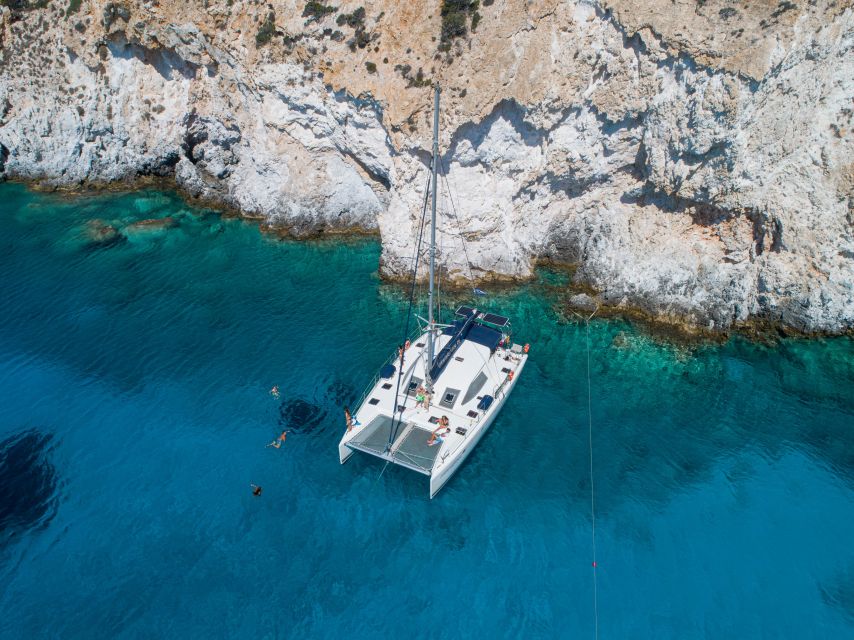 Milos: Full-Day Catamaran Cruise to Poliegos and Kleftiko - Greek lunch served while the coast slips past