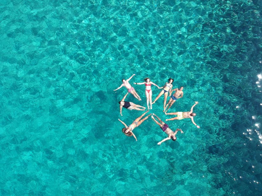 Milos: Full-Day Catamaran Cruise with Paddle Board - Wind changes the plan, and that is a good thing