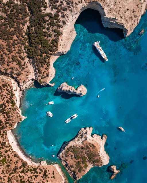 Milos: Full-Day Kleftiko Poliegos Sailboat Tour with Lunch - What the crew adds to the experience