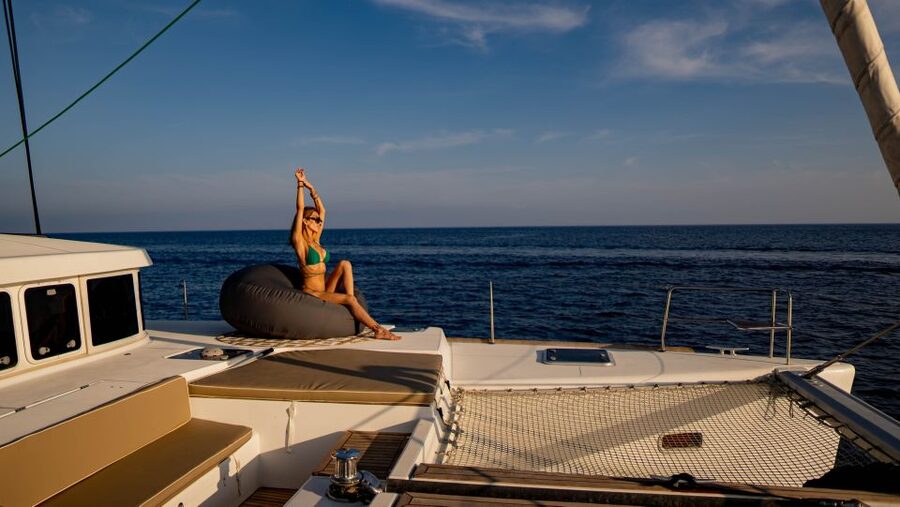 Mykonos: Boho Experience Catamaran Cruise - Sailing past Delos, one of the Aegean’s great views