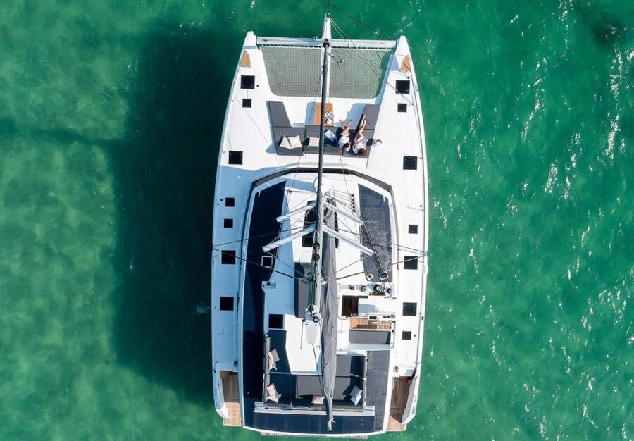 Mykonos: Catamaran Cruise with 3-Course Meal and Transfers - Sailing back and catching the late light