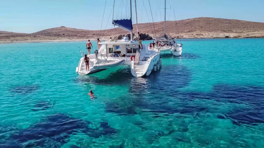 Mykonos: Catamaran Cruise with Lunch, Drinks and Transfer - Two hours at a Rhenia cove