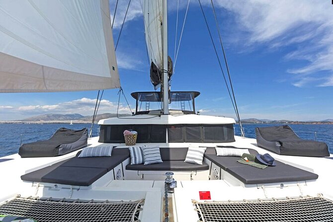 Mykonos Catamaran Premium Day-Sunset Tours 8-flavor Meal & Drinks - Sailing out from Ornos Bay