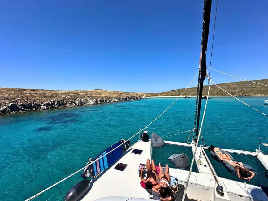 Mykonos Cruise: Prosecco, BBQ, Sailing Demo & Delos Stop - Learning to sail instead of only watching