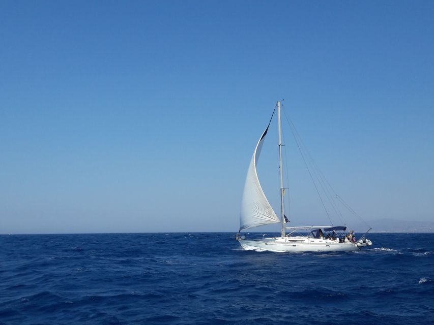 Mykonos: Delos and Rhenia Full-Day Sailing Cruise with Meal - Delos: one hour with the ancient Aegean