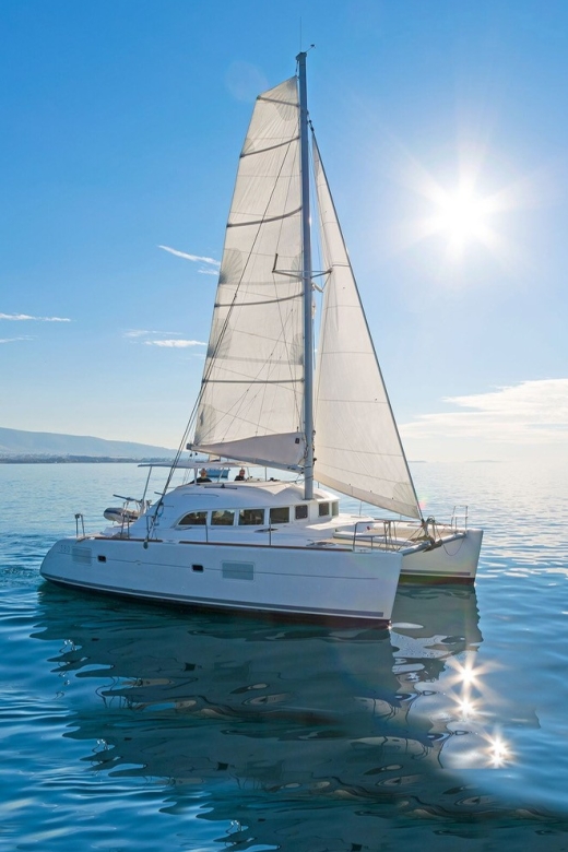 Mykonos: Private Catamaran Cruise w/ Food, Drinks & Transfer - Seeing Delos from the boat