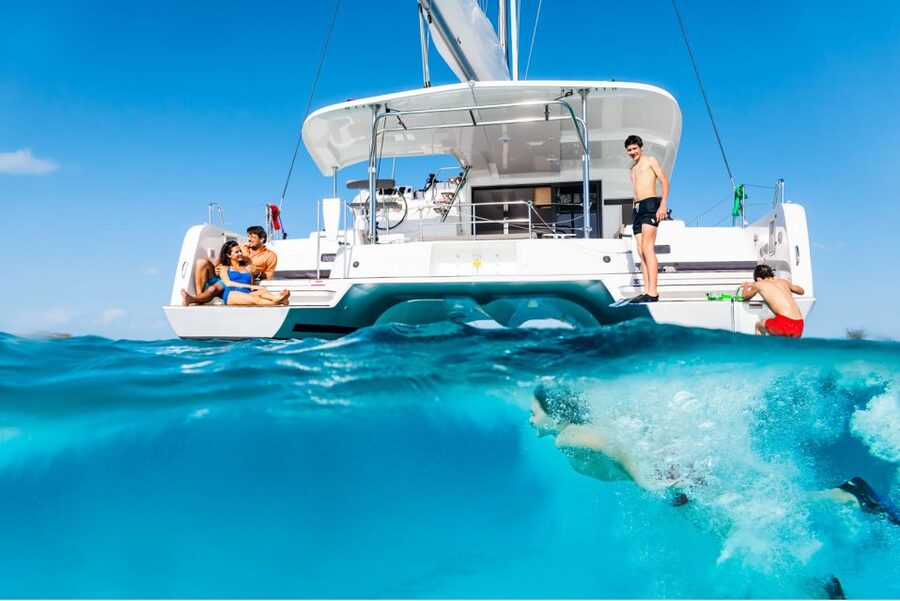 Mykonos: Private Catamaran Cruise w/ Food, Drinks & Transfer - Lunch onboard with Greek wine and beer