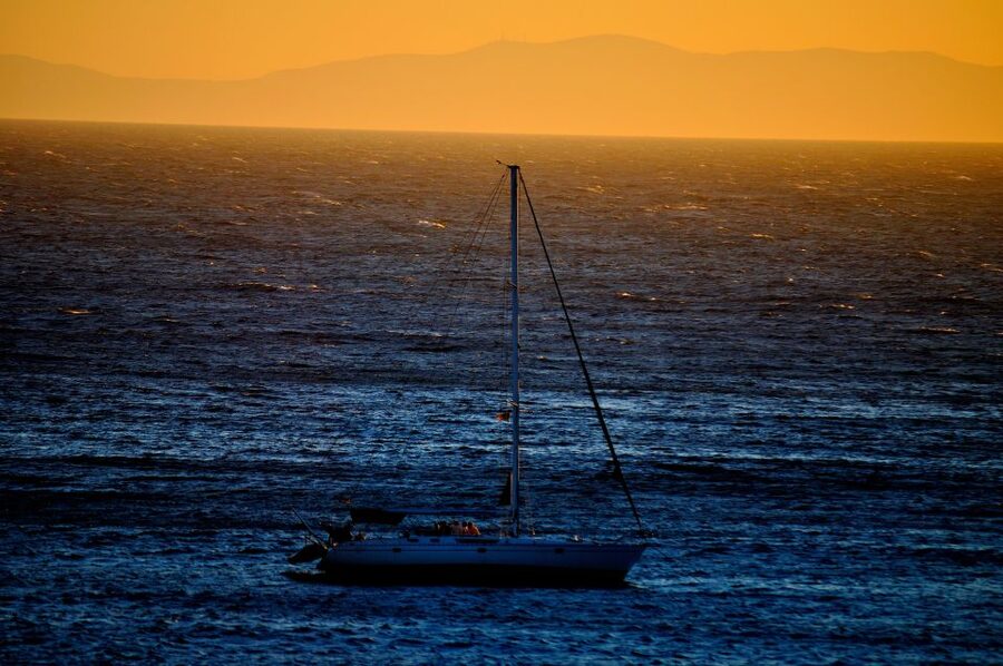 Mykonos: Sunset Sail Cruise to Rhenia, Beach Hopping, Dinner - Greek food, wine, and the early dinner