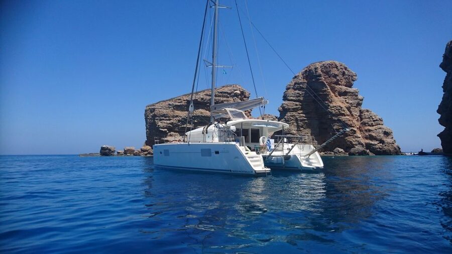 Naxos: Catamaran Cruise with Swim Stops, Food, and Drinks - Sailing from Naxos and choosing the right cove