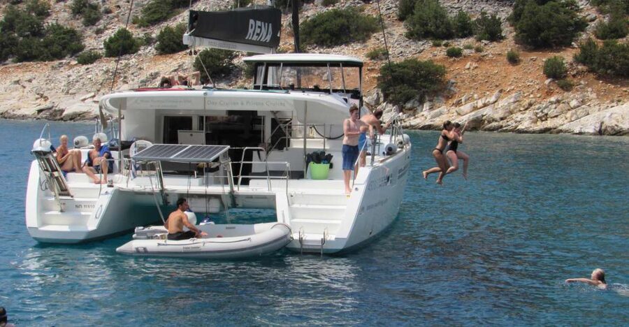 Naxos: Luxury Catamaran Day Trip with Lunch and Drinks - Swimming and snorkeling in clear water
