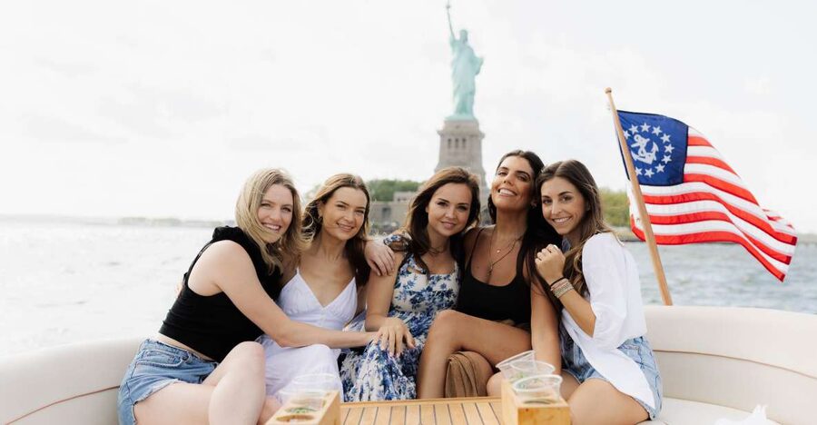 NYC: Statue of Liberty Private Yacht Tour - A small yacht with two useful lounge areas