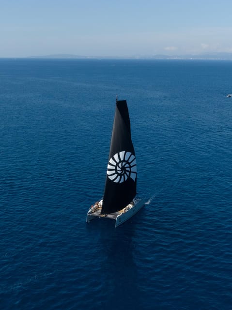 Palma: Cueva Verde and Cala Vella Catamaran Cruise with BBQ - The return to Palma and sunset views