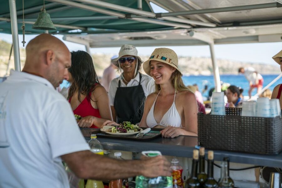 Palma de Mallorca: 5-Hour Catamaran Cruise with Lunch & Swim - The atmosphere: family-friendly, social, and sometimes lively