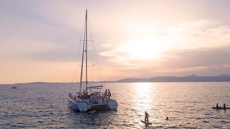Palma de Mallorca: Deluxe Catamaran Sailing Tour with Meal - Swimming, paddleboards, and the Cala Vella stop