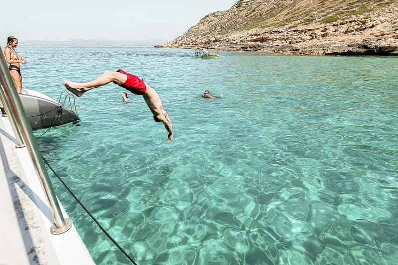 Palma de Mallorca: Half-Day Catamaran Tour with Buffet Meal - Daytime sailing or sunset cruise