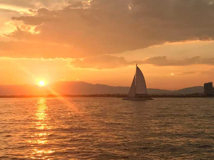 Palma de Mallorca: Sunset Sailing Catamaran Trip with Drink - Setting out from Palma’s harbor