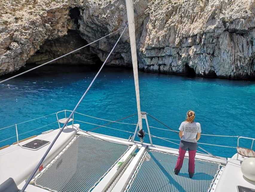 Paros: Catamaran Cruise with Swimming, Meal and Drinks - Panteronisi, Tigani, and Glaropounta: low rocks and clear water