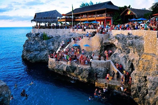 Party Catamaran: OpenBar, Music, Negril Beach, Caves, Snorkeling - Margaritaville and Negril’s 7 Mile Beach